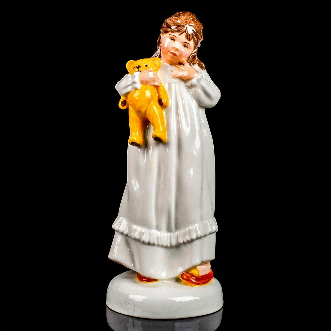 And So To Bed HN2966 - Royal Doulton Figurine: Childhood Days series. Girl in white nightgown, holding her teddy bear. Royal Doulton backstamp. Artist: Pauline Parsons Issued: 1982 - 1985 Dimensions: 7.5"H Manufacturer: Royal Doulton Country of Or