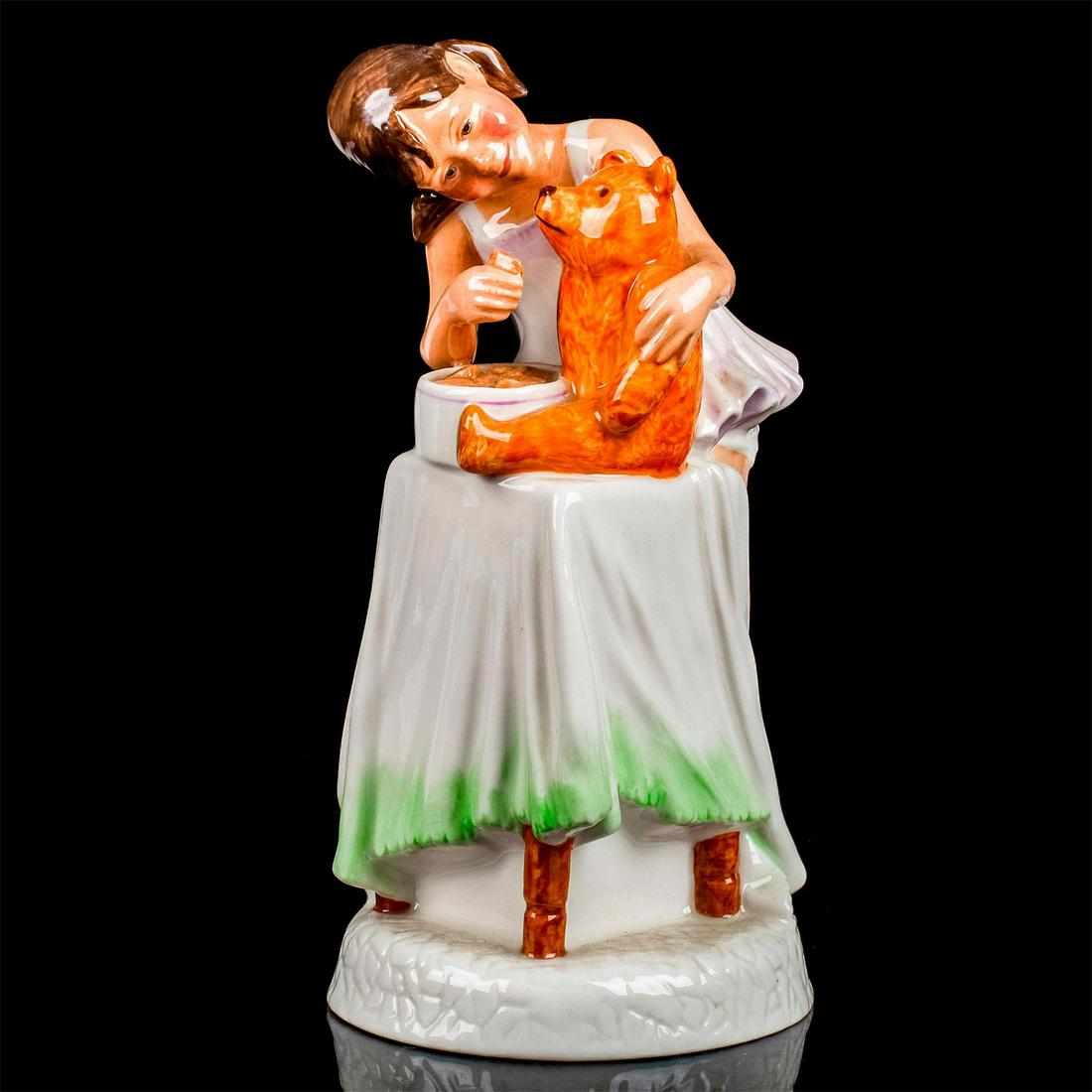 And One For You HN2970 - Royal Doulton Figurine: Childhood Days series. A young girl shares her cookies with her favorite playmate. Royal Doulton backstamp. Artist: Amanda Hughes Issued: 1982 - 1985 Dimensions: 6.5"H Manufacturer: Royal Doulton Coun