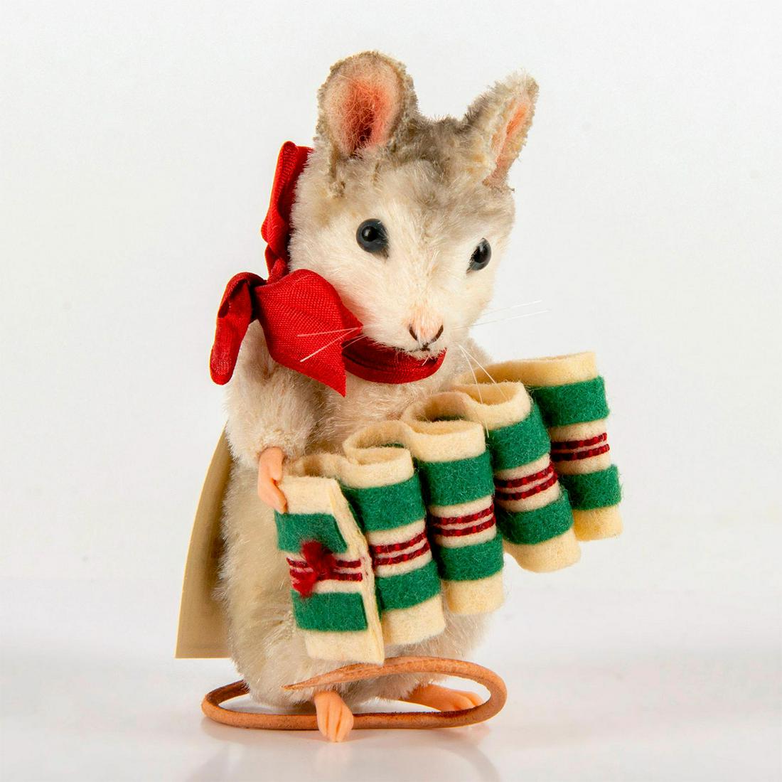 R. John Wright Doll, Christmas Mice, Merry: Mohair mouse with jointed neck, arms, and shoulders, embroidered features, glass eyes, resin hands, and leather tail. Holds felt ribbon candy. Second in the Christmas Mice collection. Made exclusively