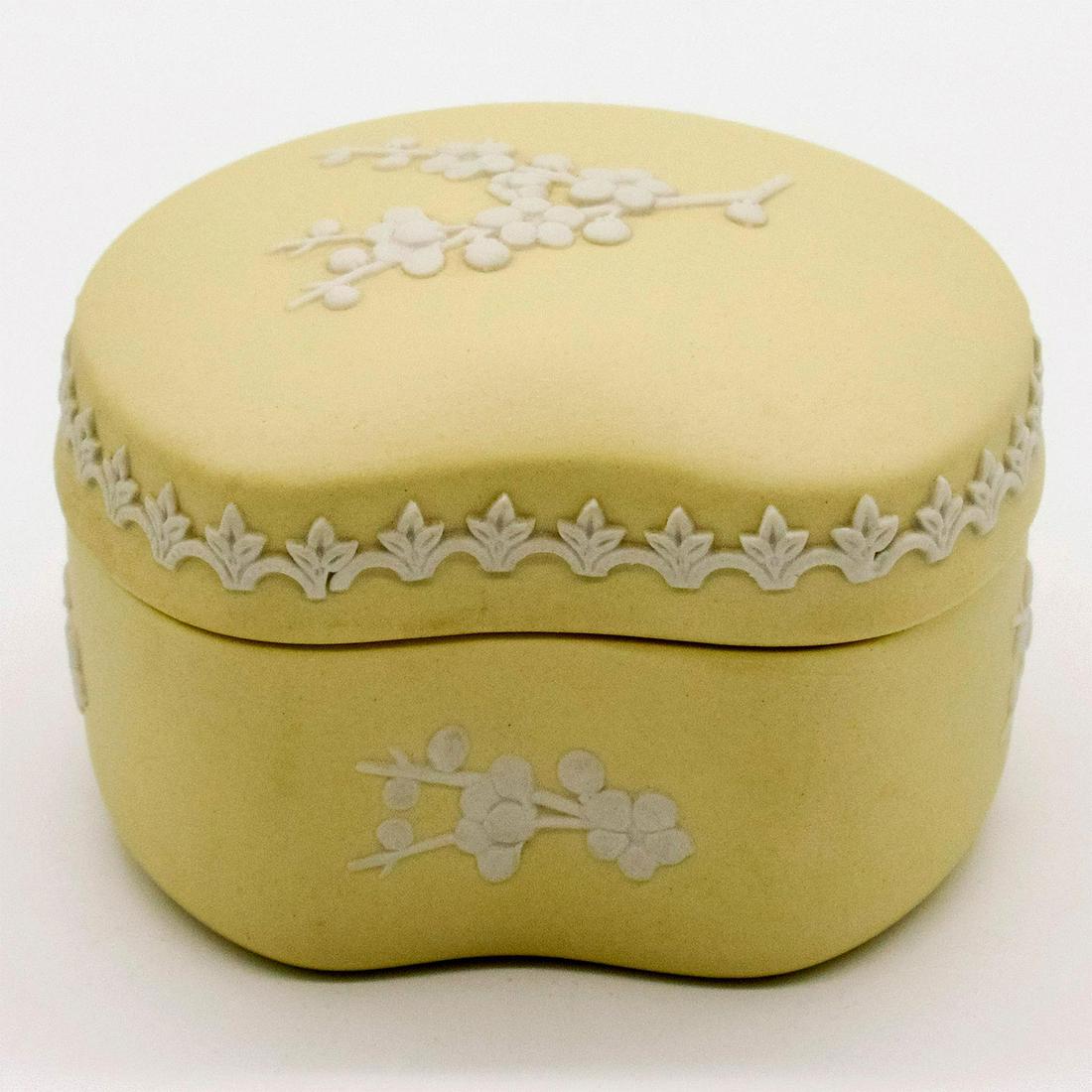 Wedgwood Primrose Jasperware Bean Box: Removable lid; cream colored decorations in relief depicting plum blossoms. Wedgwood impressed on base. Good condition. #wedgwood #jasperware #primrose #beanbox Dimensions: 2.25"H Issued: 20th - 21st