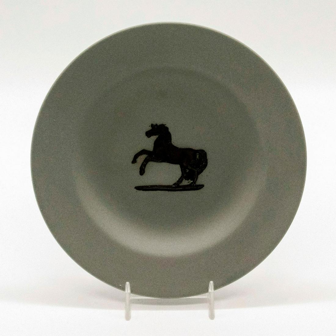 Wedgwood Grey Jasperware Round Horse Tray: Black decoration in relief depicting a horse rearing. Wedgwood impressed onto base. Good condition. #wedgwood #jasperware #tray #horse Dimensions: 4.25" dia. Issued: 20th c. Manufacturer: Wedgwood Cou