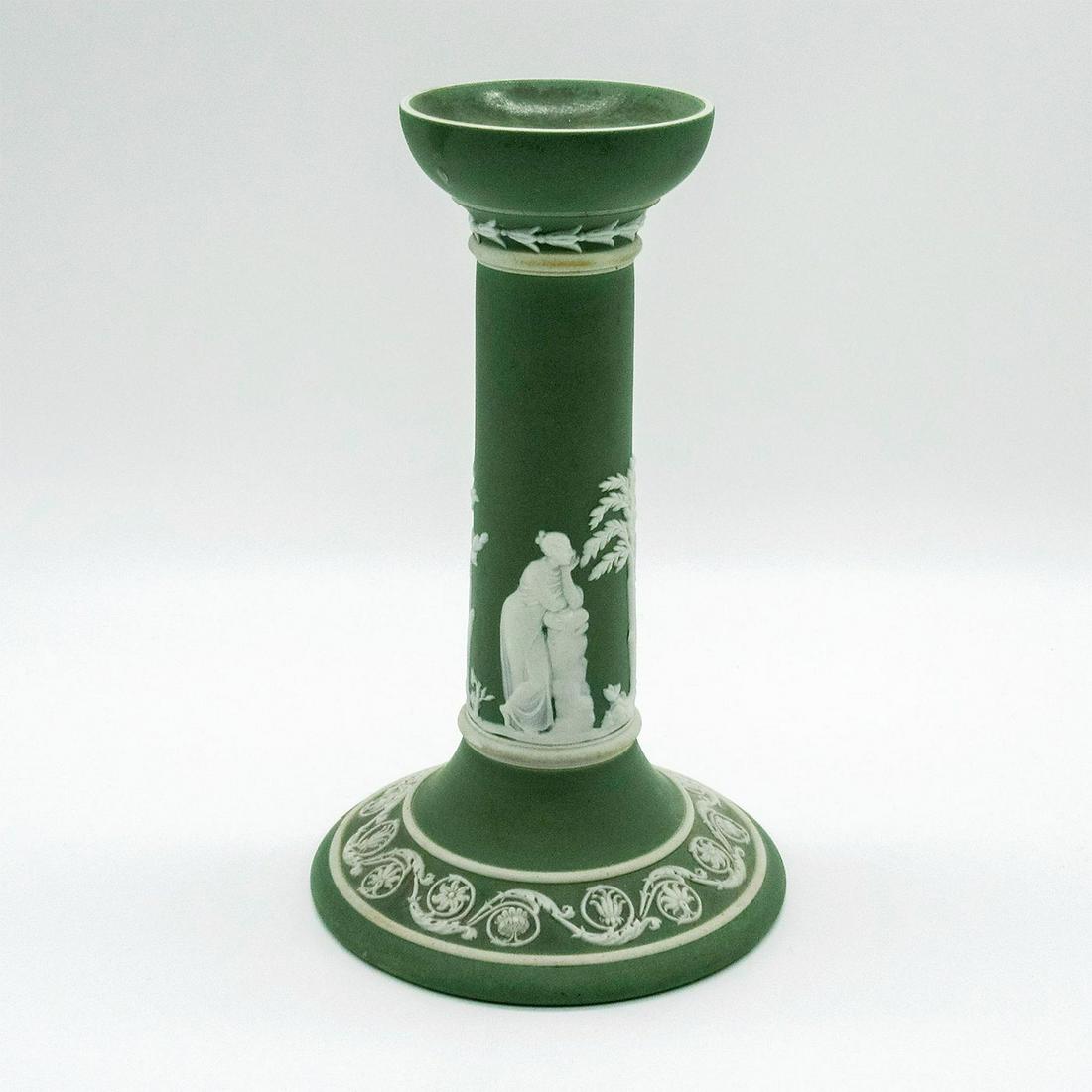 Wedgwood Cream on Celadon Jasperware Candlestick: Cream colored relief decorations depicting Grecian figures, one with a harp. Wedgwood impressed on base. Some residual wax stuck to piece. #wedgwood #jasperware #candlestick Dimensions: 7.25"H Issued: