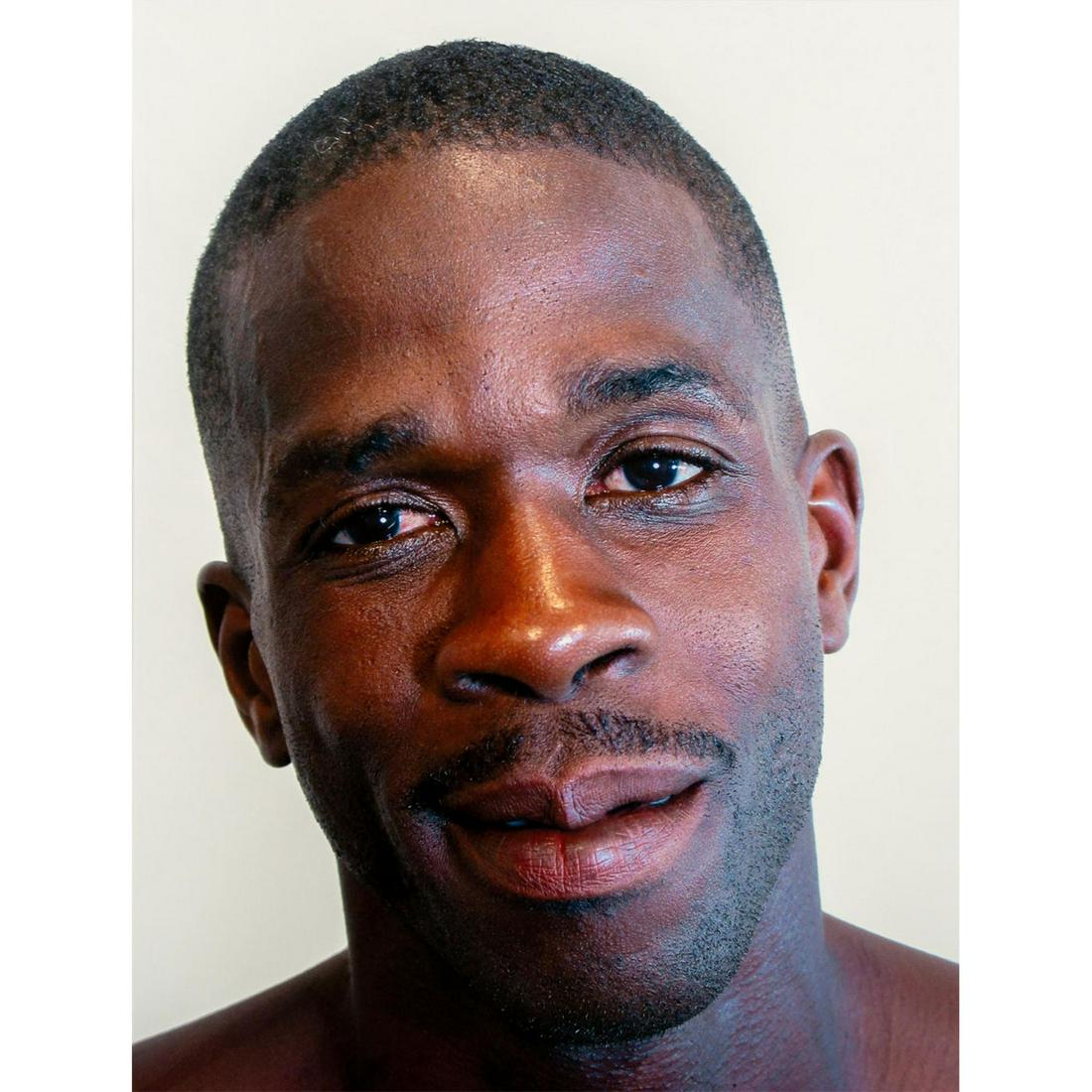 Tim O. Walker (American) Signed, Photograph, Berry: Archival Ultrachrome ink on paper with white matte. Portrait of a smiling man. Signed lower right, pencil. Titled and numbered I of VI lower left, pencil. From the portfolio Look at Me, is an ongoing 