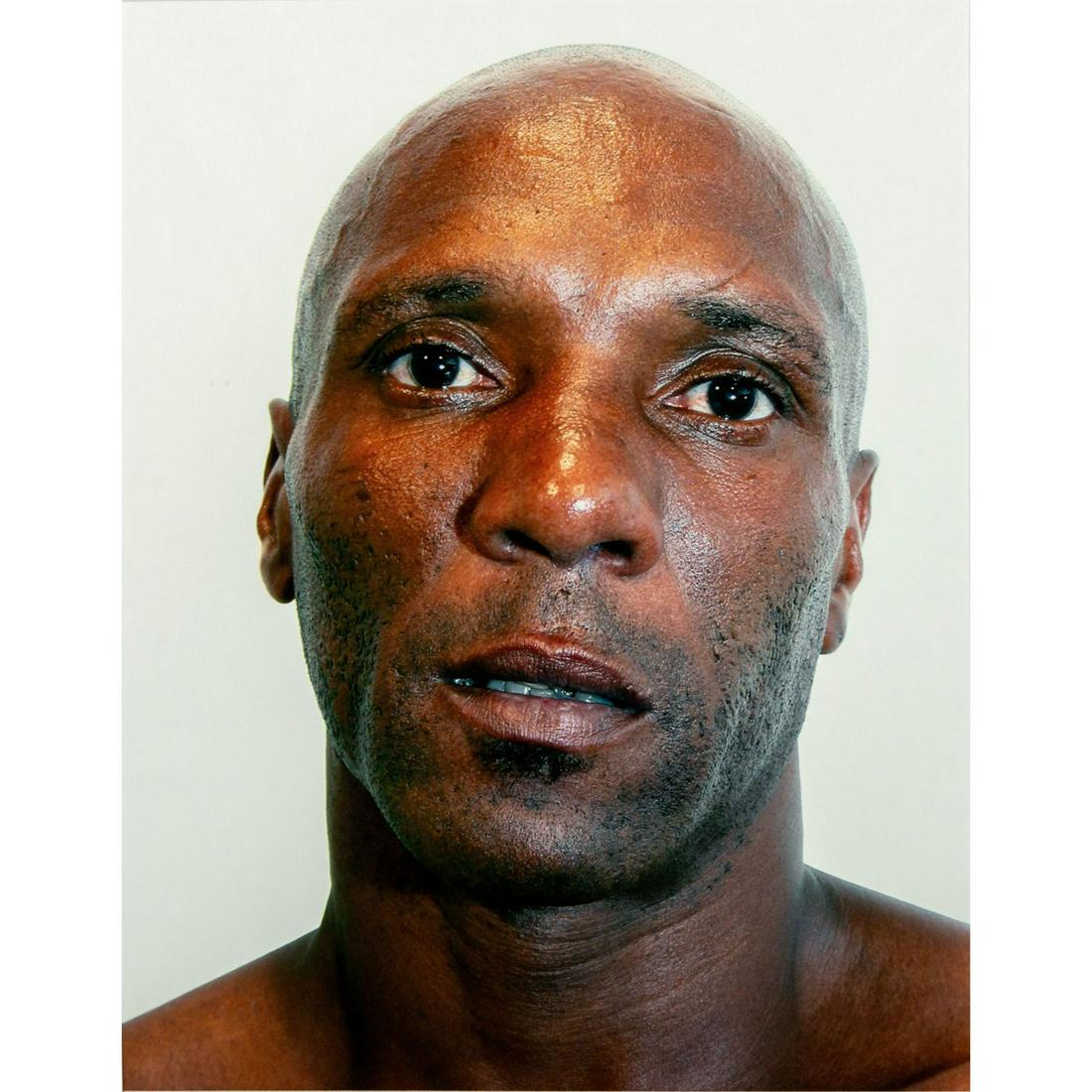 Tim O. Walker (American), Signed, Photograph, Spencer: Archival Ultrachrome ink on paper with white matte. Portrait of a man with a serious expression. Signed lower right, pencil. Titled and numbered 1 of VI lower left, pencil. From the portfolio Look at 
