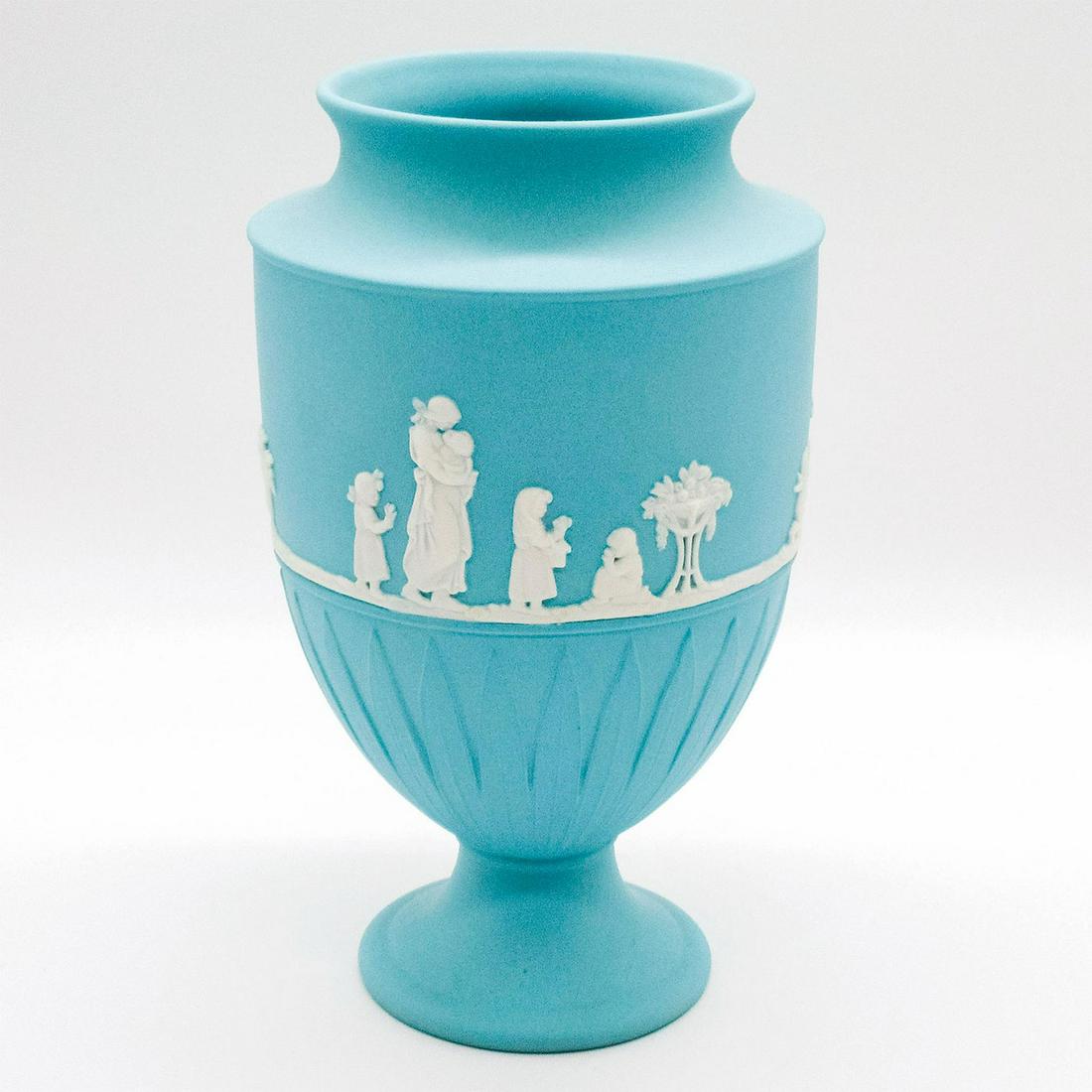 Rare Wedgwood Turquoise Jasperware Vase: Classical urn form with pedestal vase; white Grecian decorations in relief. Wedgwood sigil impressed on base. Good condition. #wedgwood #jasperware #vase #urn Issued: 20th c. Dimensions: 8"H Manufactu