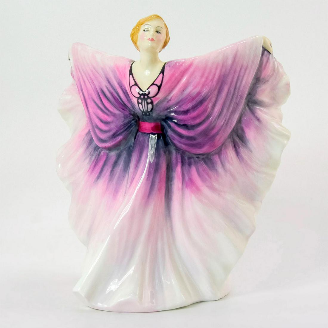 Isadora HN2938 - Royal Doulton Figurine: Bone China. Woman in a lavender butterfly dress. Series: Classic Pretty Ladies. Royal Doulton backstamp. Weight: 1 lb 11.9 oz Artist: Peter Gee Issued: 1986 - 1992 Dimensions: 8"H Manufacturer: Royal 