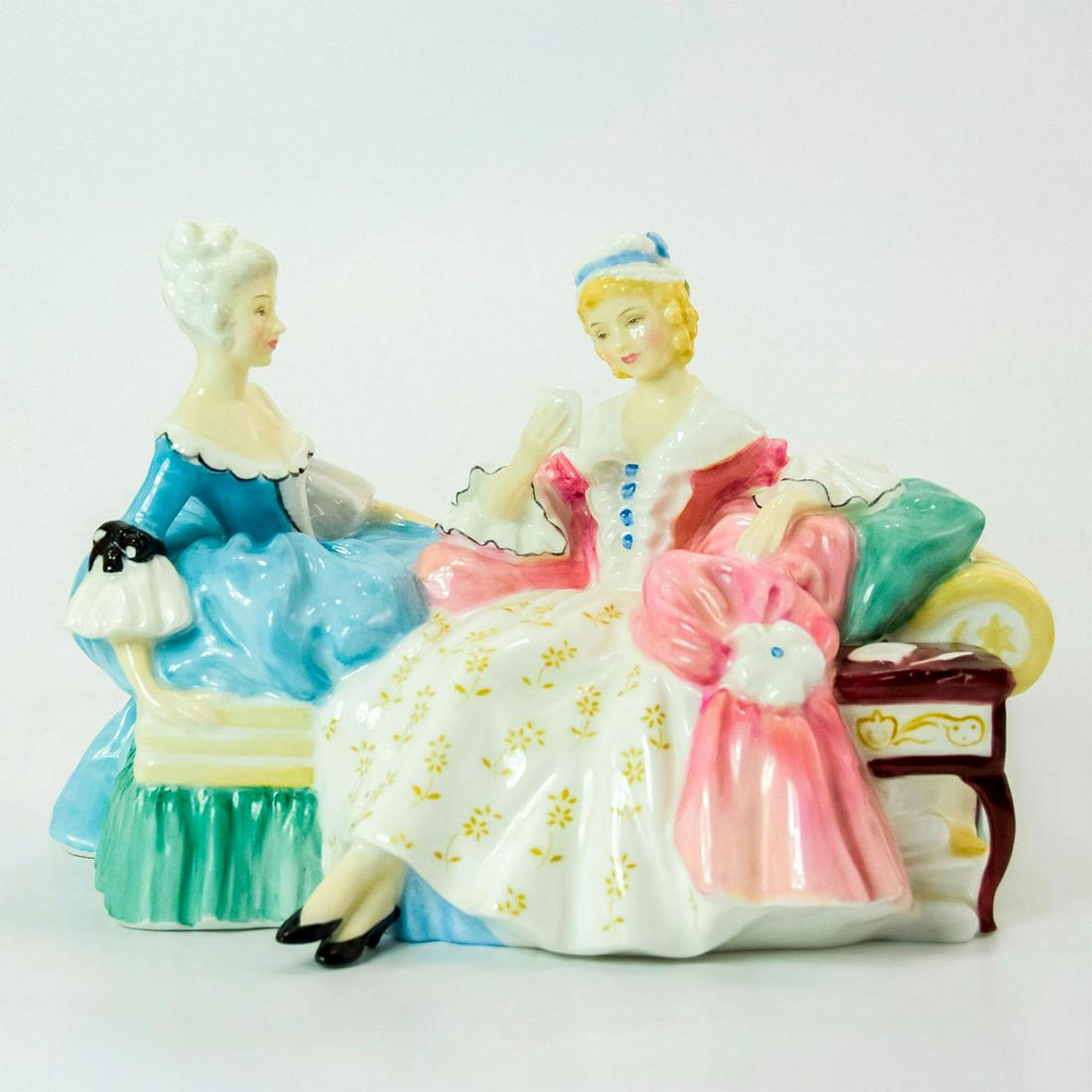 Love Letter HN2149 - Royal Doulton Figurine: Bone China. Two ladies in pink and blue dresses reading a love letter. Series: Romantic Theme. Royal Doulton backstamp. Artist: Peggy Davies Issued: 1958 - 1976 Dimensions: 5.5"H Manufacturer: Royal D