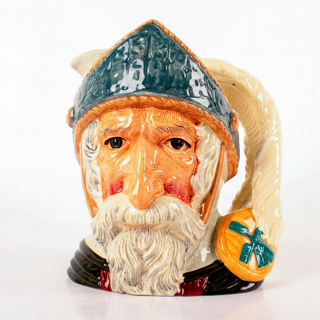 Don Quixote D6455 - Large - Royal Doulton Character Jug: Blue-grey helmet, dark green robes. Don Quixote is the hero of the novel by Cervantes, a satirical parody of this chivalrous knight. Don Quixote leads a life of adventure, capturing many hearts along 