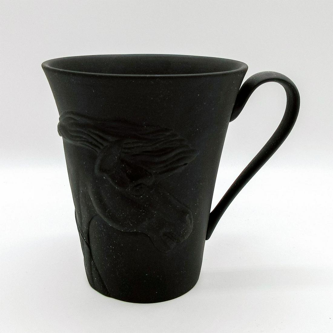 Wedgwood Black Basalt Mug, The Frightened Horse: Wedgwood 250 Years Anniversary mug by George Stubbs. Matte black ground; relief design. Wedgwood backstamps. #mug Issued: 21st c. Dimensions: 4"H Manufacturer: Wedgwood Country of Origin: England