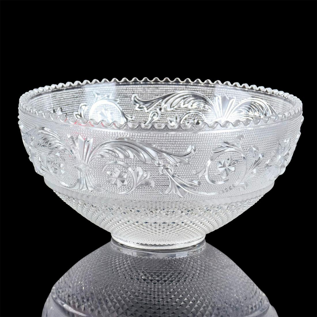 Baccarat Crystal Arabesque Crystal Bowl: Handmade French crystal small bowl showcasing exquisitely designed scrolling foliage and beaded designs. Sawtooth rim design. Baccarat mark to interior. #bowl Issued: 20th c. Dimensions: 2.25"H x 4.75