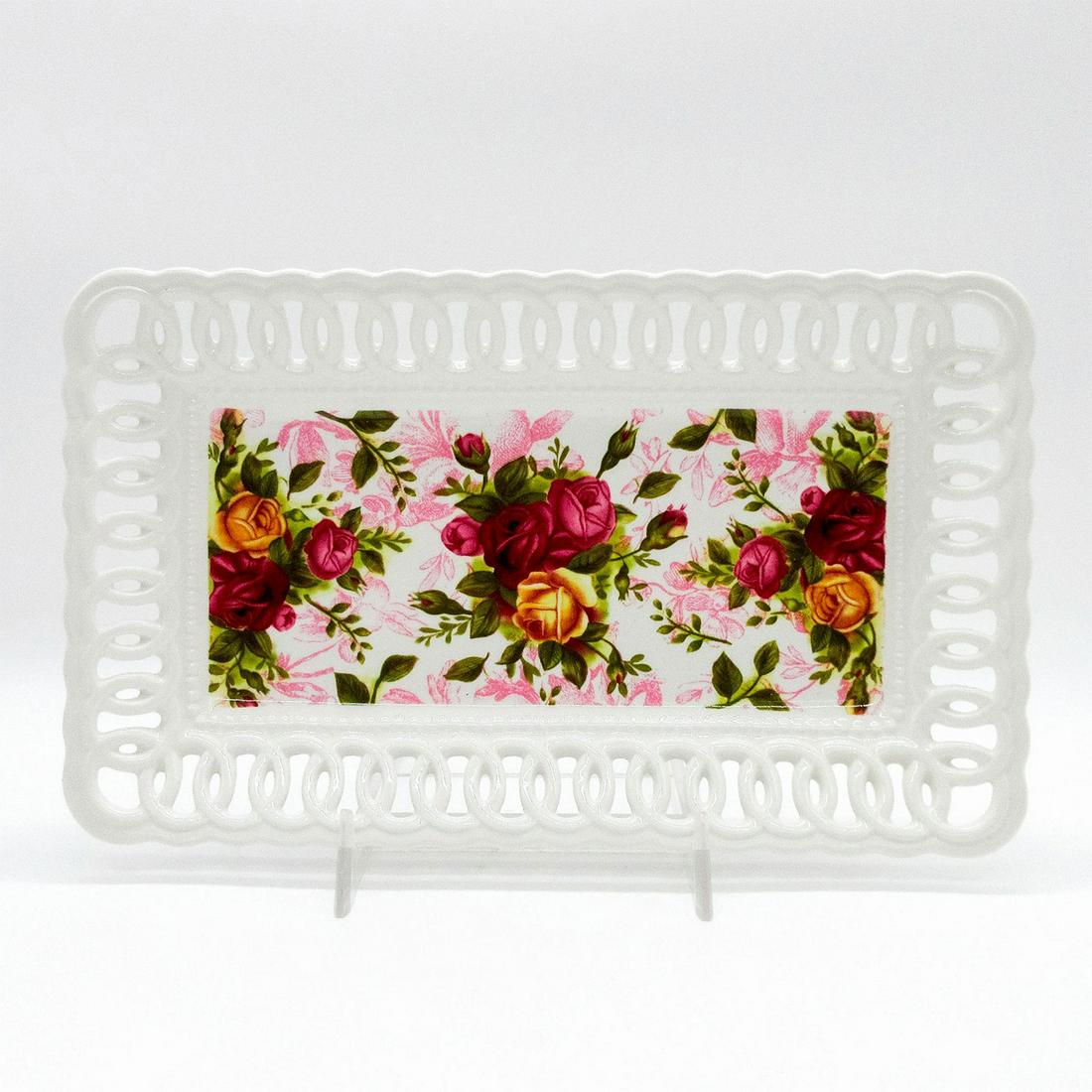 Royal Albert Bone China Tray, Old Country Roses: Glazed ceramic rectangular tray; Old Country Roses pattern; pierced scalloped rim. Royal Albert backstamp. #tray Issued: 2002 Dimensions: 8.75"L x 5.25"W Manufacturer: Royal Albert Country of Origin: 