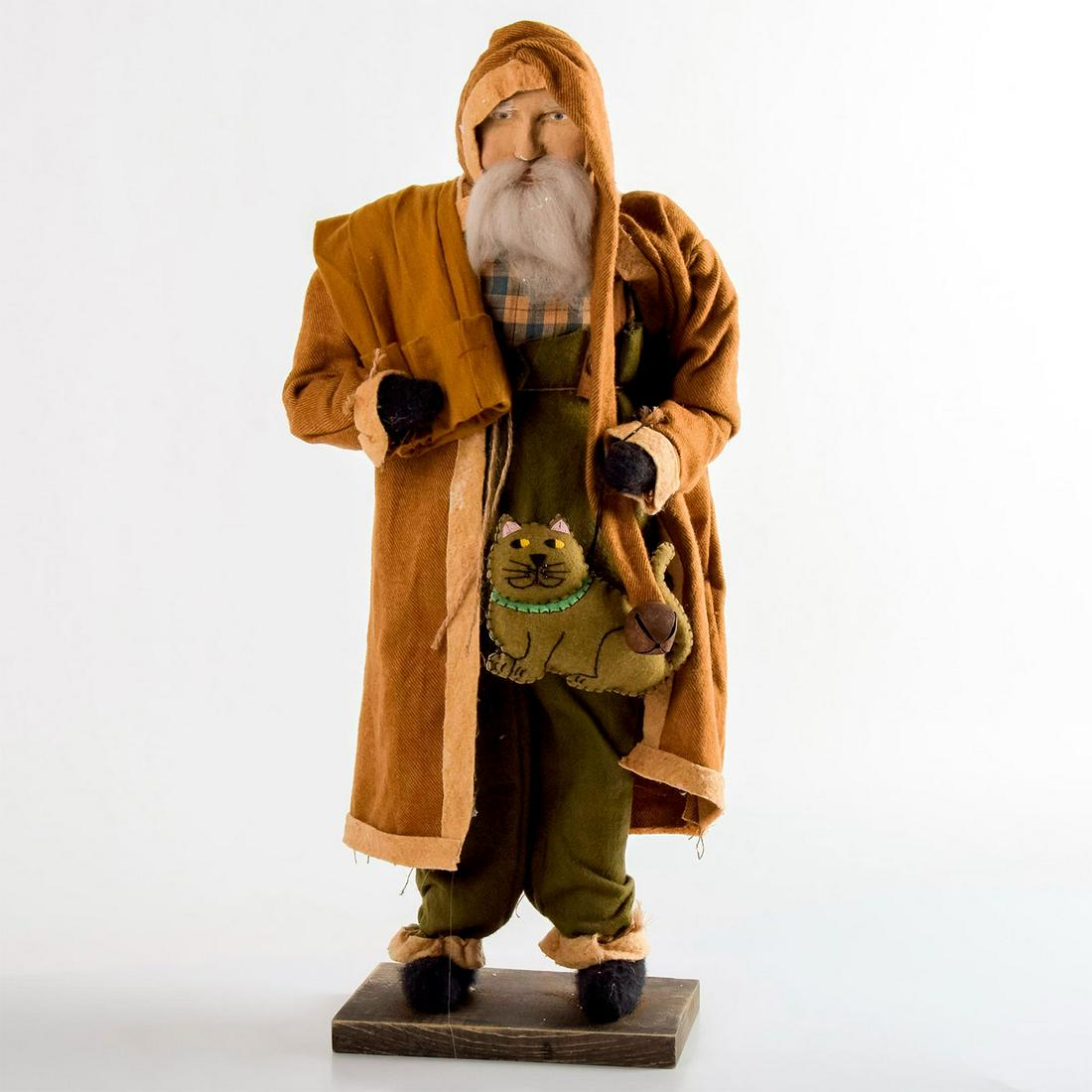 Arnett?s Country Store, Large Santa Holding a Cat Doll: Hand crafted 23" tall Santa doll. Wearing green overalls, blue and beige plaid shirt and long brown coat. Since 1976, Arnett’s Country Store, Made in USA stamped on the bottom. Age related wears. Ov