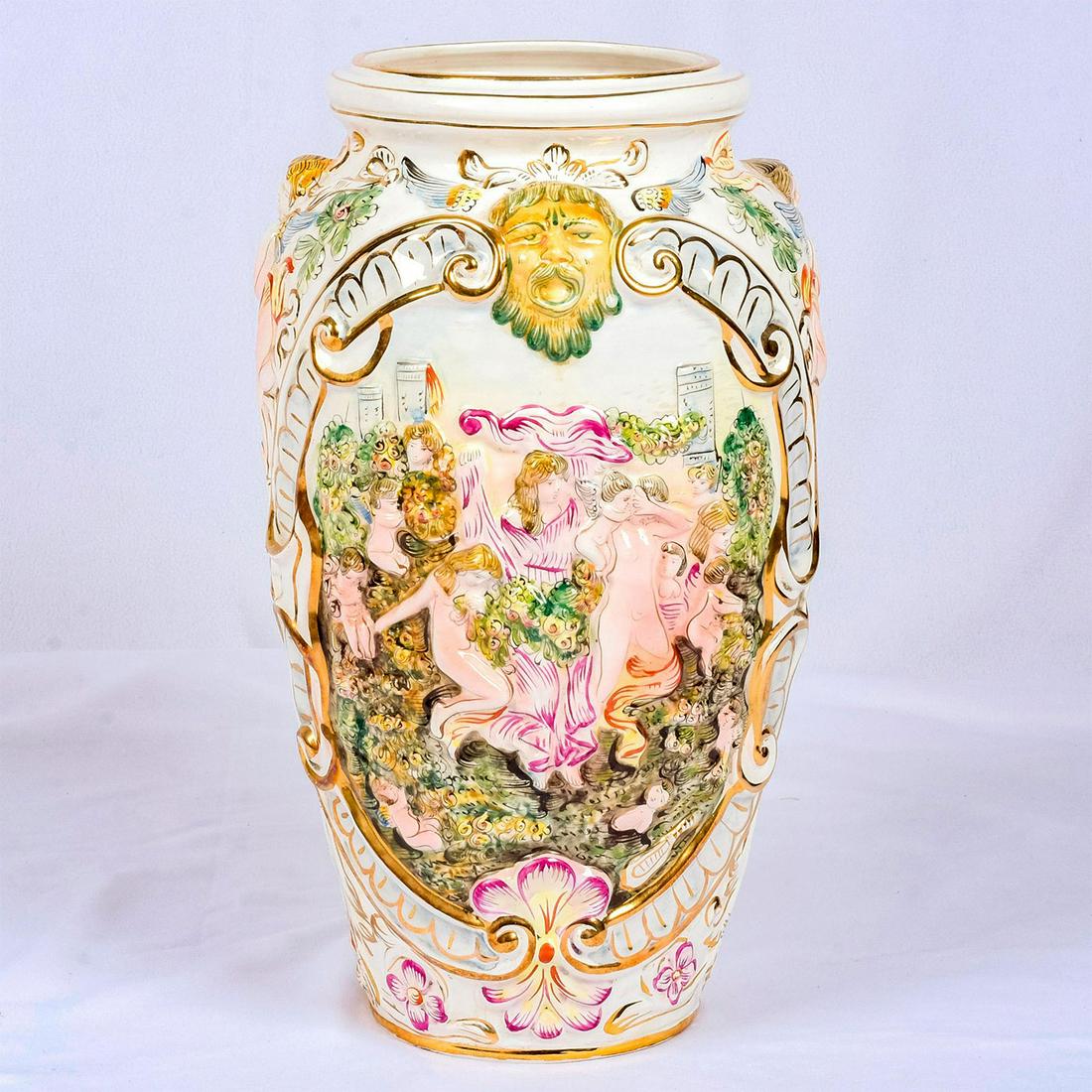 Impressive Capodimonte Ceramic Vase, Cherubs: Monumental Rococo style ornamental vase depicting nude women and cherubs in relief encircling body. Polychrome glazed vase; gilt accents throughout. Capodimonte Italy backstamp. Weight: 11 lbs #vase #