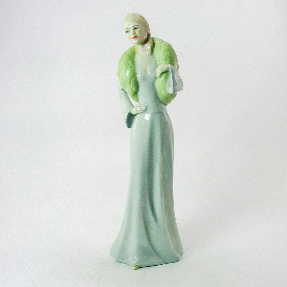Chic HN2997 - Royal Doulton Figurine: Large figurine of a woman in a pale blue dress and green fur scarf. Series: Reflections. Royal Doulton backstamp. Artist: Robert Tabbenor Issued: 1987 - 1990 Dimensions: 13"H Manufacturer: Royal Doult