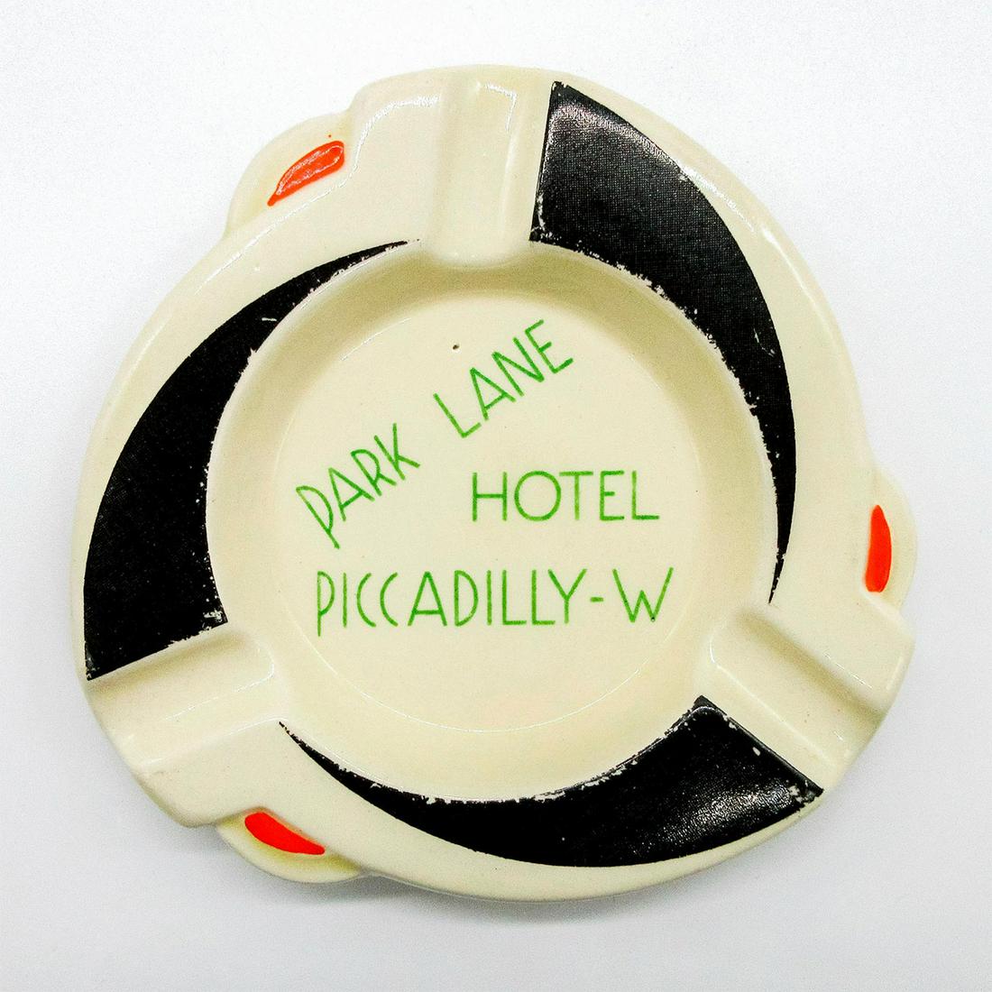 Royal Doulton Ashtray, Park Lane Hotel: Advertising ware ashtray. Glazed ceramic; 3 slots. Doulton backstamp. #ashtray Issued: 20th c. Dimensions: 4.25"W Manufacturer: Royal Doulton Country of Origin: England