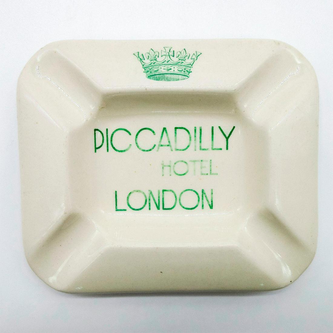 Royal Doulton Ceramics Ashtray, Piccadilly Hotel, London: Rectangular 4 slot ashtray; advertising ware for the Piccadilly Hotel, London. Doulton backstamp. #ashtray #hotel Issued: 20th c. Dimensions: 5"W Manufacturer: Royal Doulton Country of Origin: England