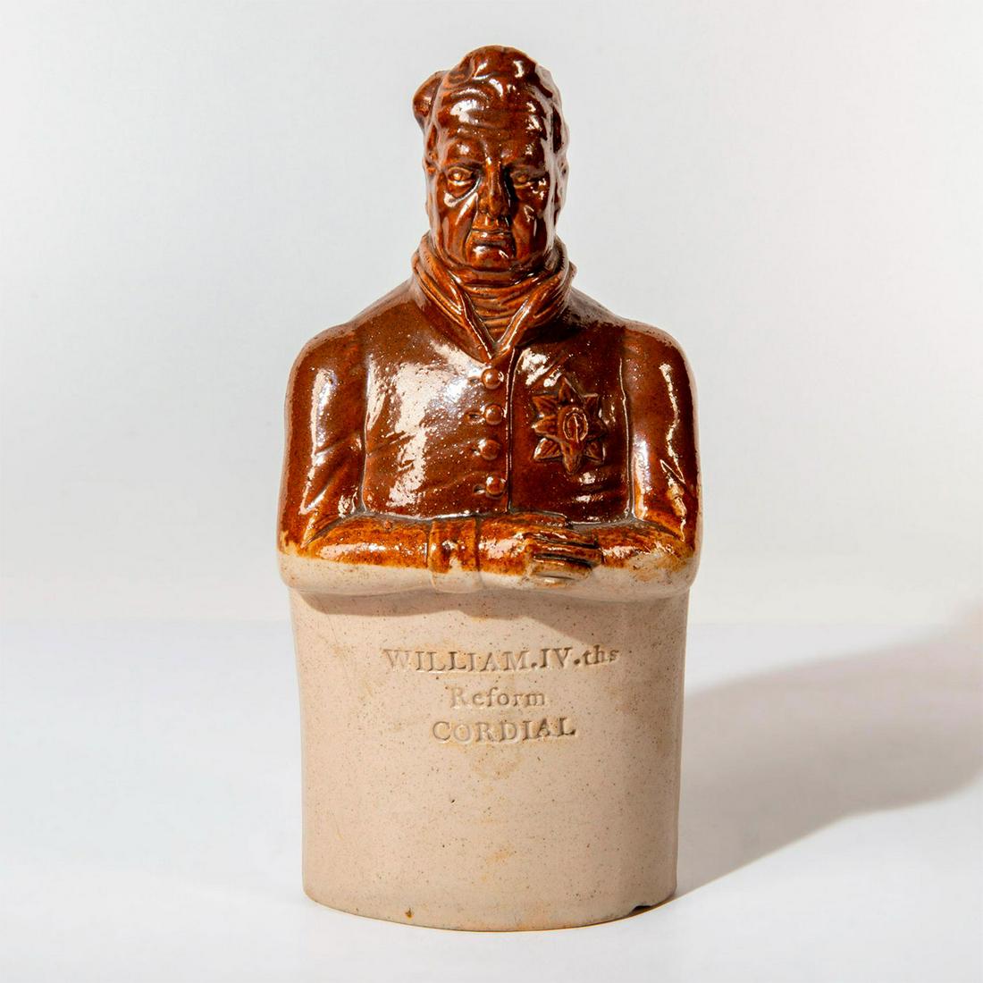 Doulton and Watts Lambeth Stoneware Spirit Flask William IV: Brown color stoneware flask, modelled as William IV, inscribed "William. IV. ths Reform Cordial". Lambeth Pottery Doulton & Watts -15- High Street, Lambeth impressed on the back. Weight - 14.0 oz. Age