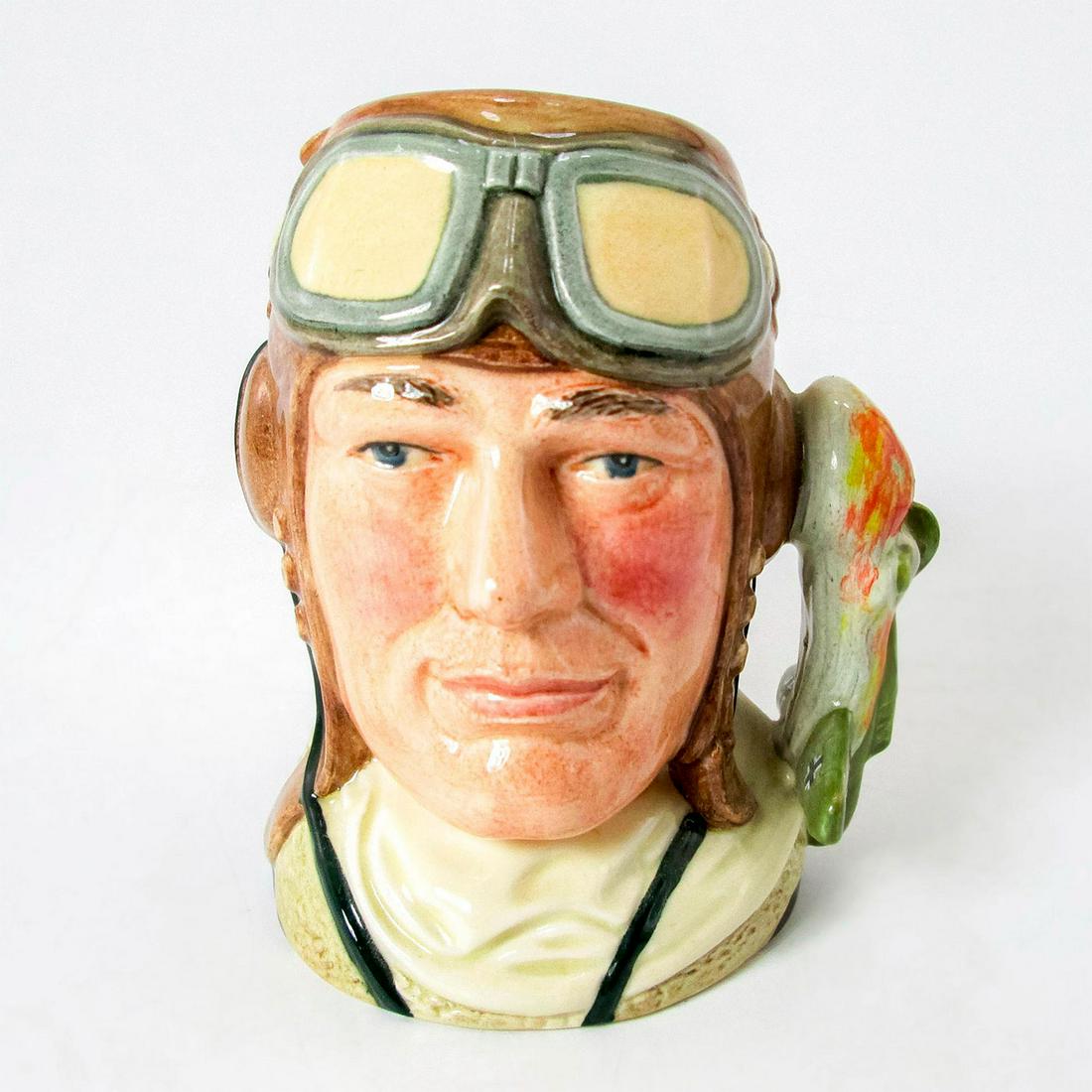 Airman Royal Air Force D6870 - Small - Royal Doulton Character Jug: Part of the Armed Forces series. Royal Doulton backstamp. Artist: William K. Harper Issued: 1991-1996 Dimensions: 4.5"H Manufacturer: Royal Doulton Country of Origin: England