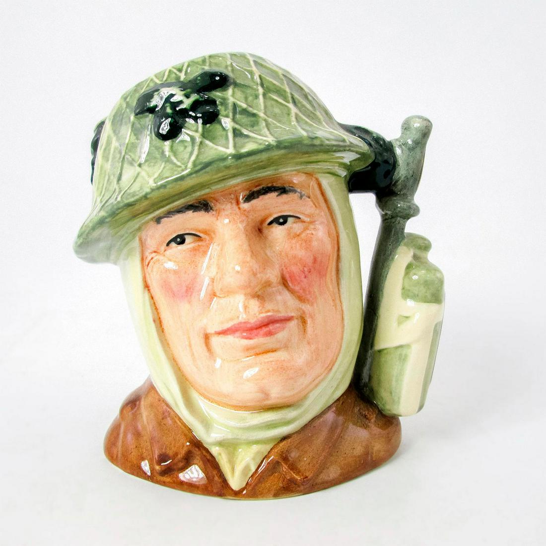 Soldier D6876 - Small - Royal Doulton Character Jug: Part of The Armed Forces series. Royal Doulton backstamp. Artist: William K. Harper Issued: 1991-1996 Dimensions: 4.5"H Manufacturer: Royal Doulton Country of Origin: England