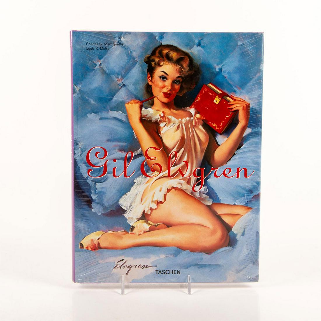 Book, Gil Elvgren By Charles Martignette, Louis Meisel: Collectible book published by Taschen. Features pin-ups by the famous American painter, Gil Elvgren. Illustrated hardcover. Dimensions: 9"W x 12"H Country of Origin: Spain