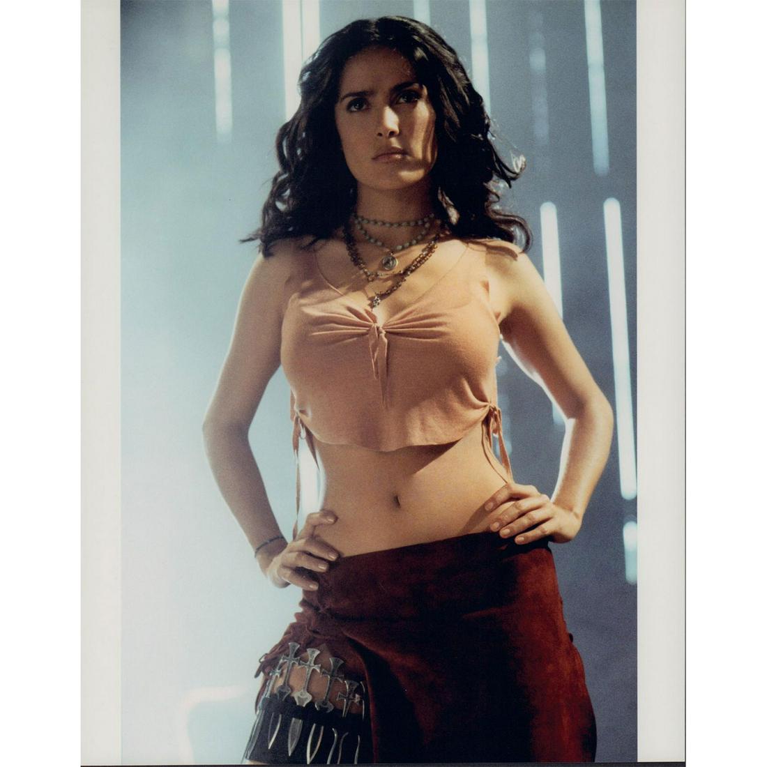 Salma Hayek Photograph: Promotional portrait of actress Salma Hayek wearing a crop top and skirt, from the 2003 film Once Upon a Time in Mexico. Printed on Fujicolor Crystal Archive paper. #salmahayek #onceuponatimeinmexico 