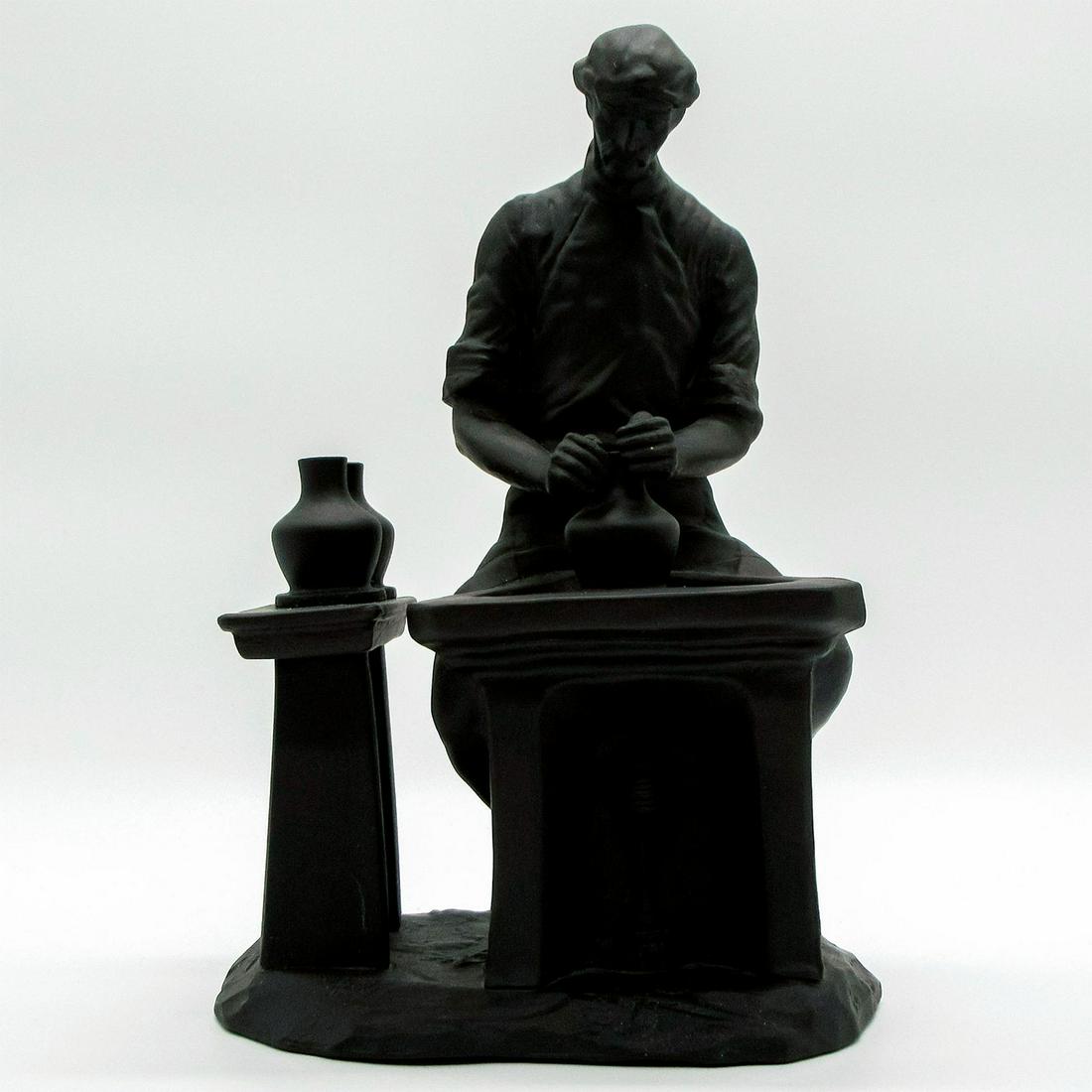 Wedgwood Black Basalt Figurine, The Potter: Limited edition of 1,000. Rare "Skills of the Nation" series figure. Wedgwood impressed on back. #wedgwood Artist: Colin Melbourne Issued: 1980 Dimensions: 5.5"W x 8.25"H Manufacturer: Wedgwoo