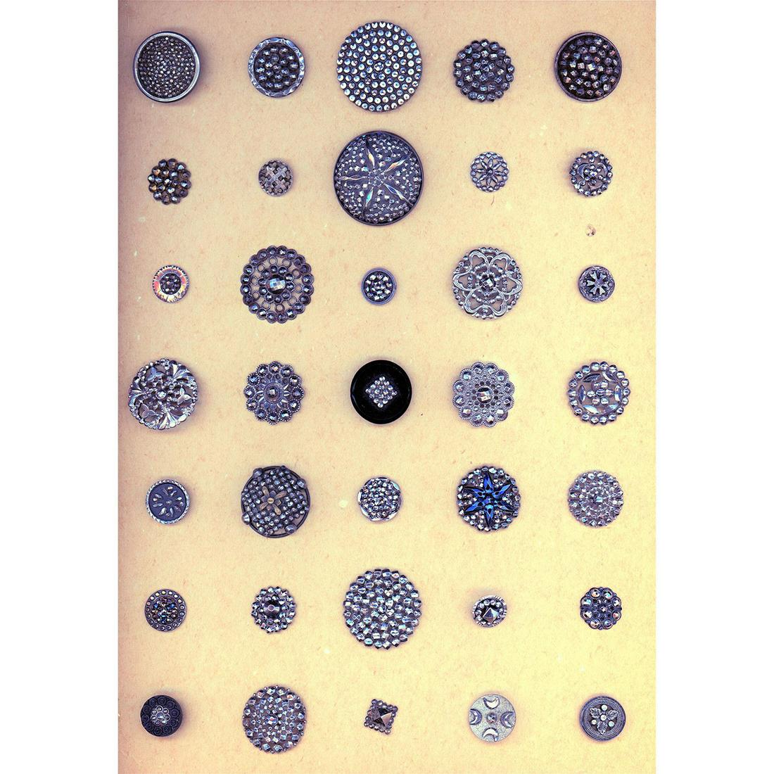 A CARD OF ASSORTED DIVISION ONE CUT STEEL BUTTONS (1 of 3)