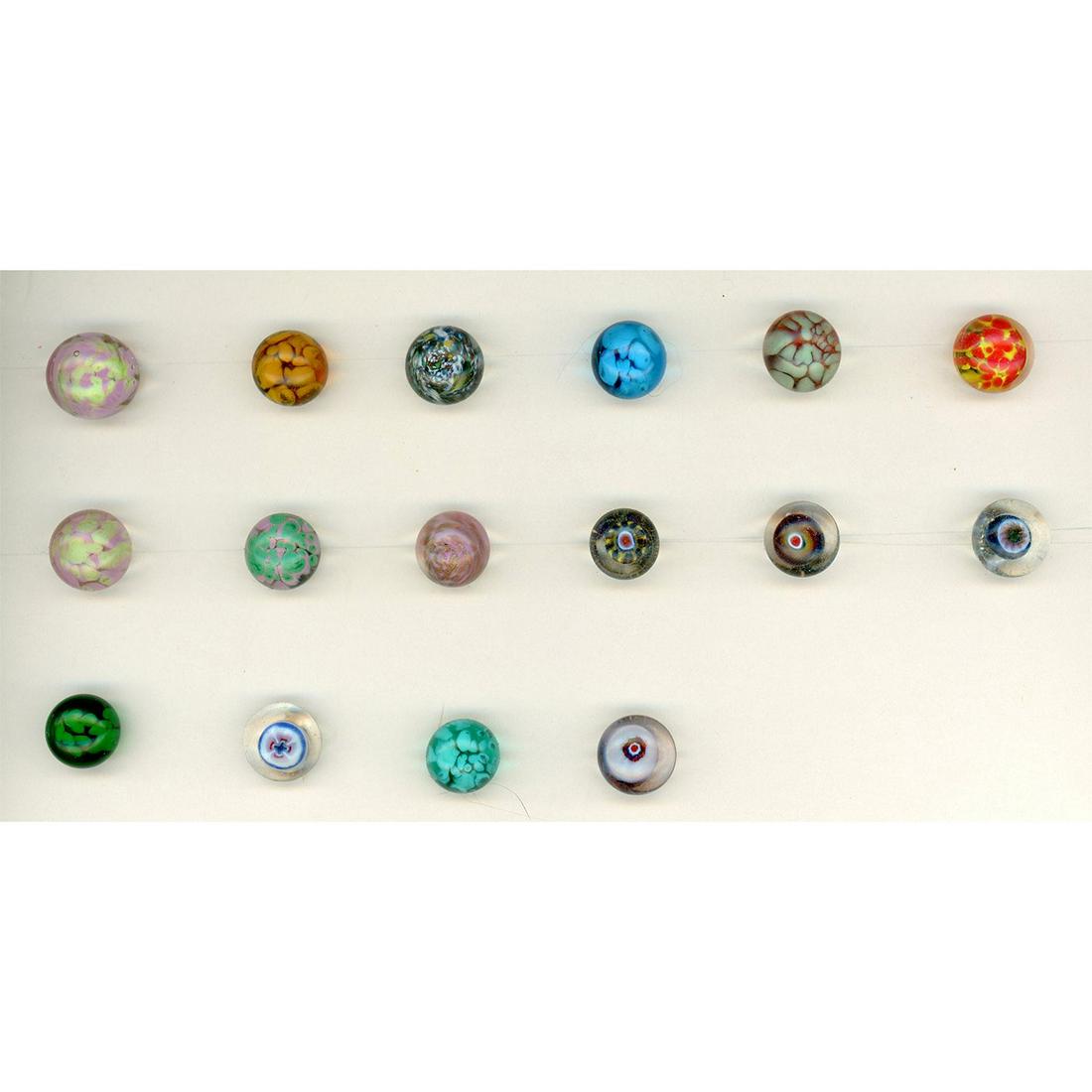 A SMALL CARD OF ASSORTED DIVISION 3 PAPERWEIGHT BUTTONS (1 of 4)