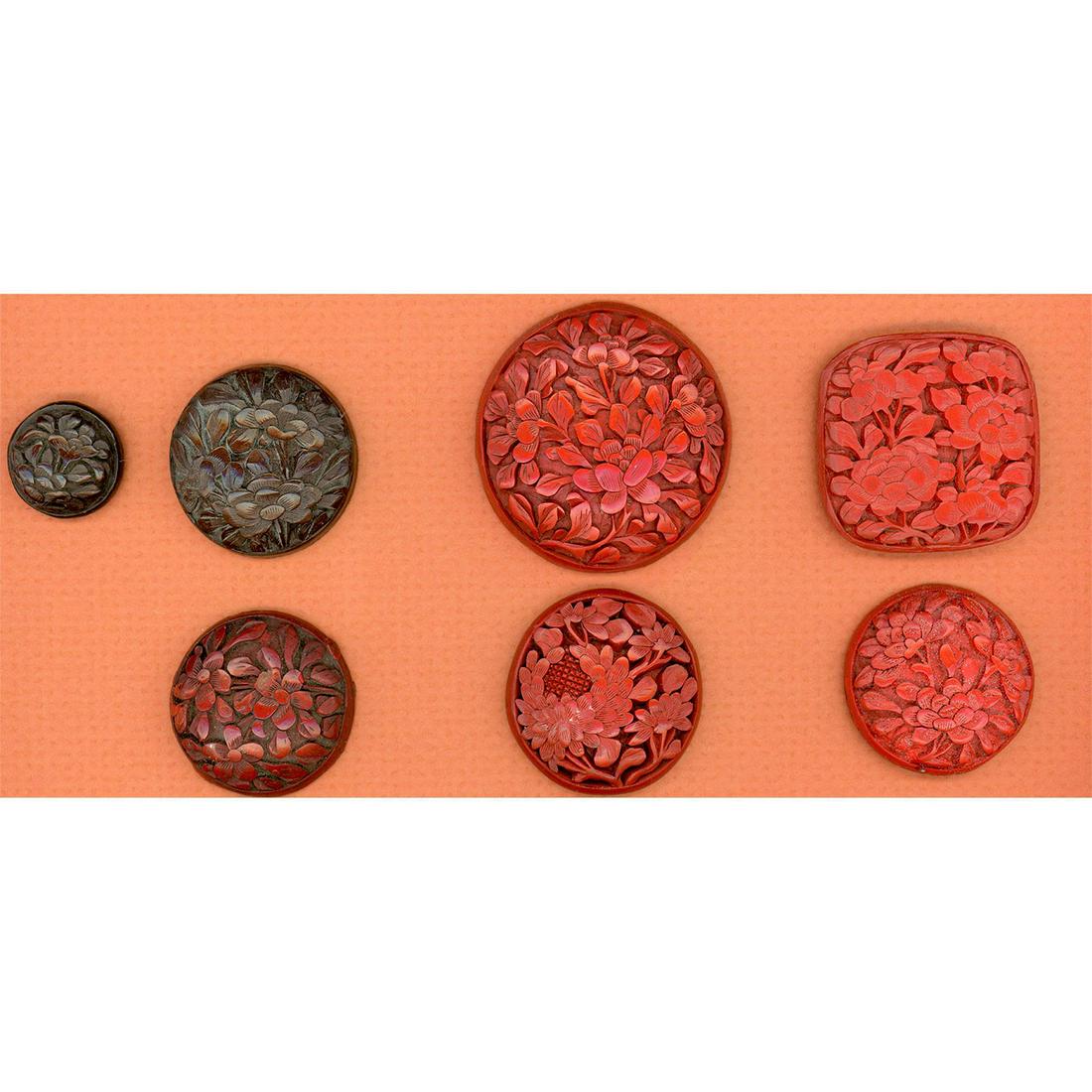 A SMALL CARD OF OLD CHINESE CINNABAR BUTTONS (1 of 3)