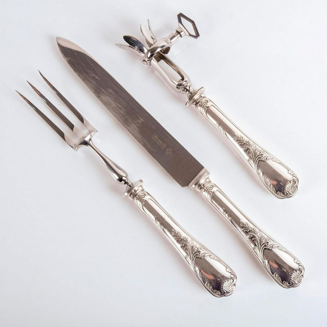 3pc Christofle Marly Pattern Silver-Plated Carving Set: Ham bone holder, caving knife and fork; rocaille with asymmetrical crawling plant and shell motifs. Christofle backstamp. Quality hallmark; "Knight" chess figure with Orfevrerie Christofle. Ham bone h