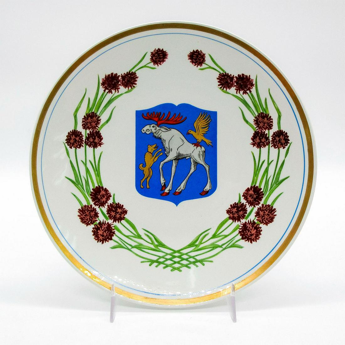 Upsala Ekeby Porcelain Decorative Plate, Brunkulla 1963: Jamtland coat of arm in center surrounded by Brunkulla orchid flowers. Gold gilt accents. Upsala Ekeby Sweden backstamp. #Sweden #Jamtland Issued: 1963 Dimensions: 8" dia. Manufacturer: Upsala Ekeby C