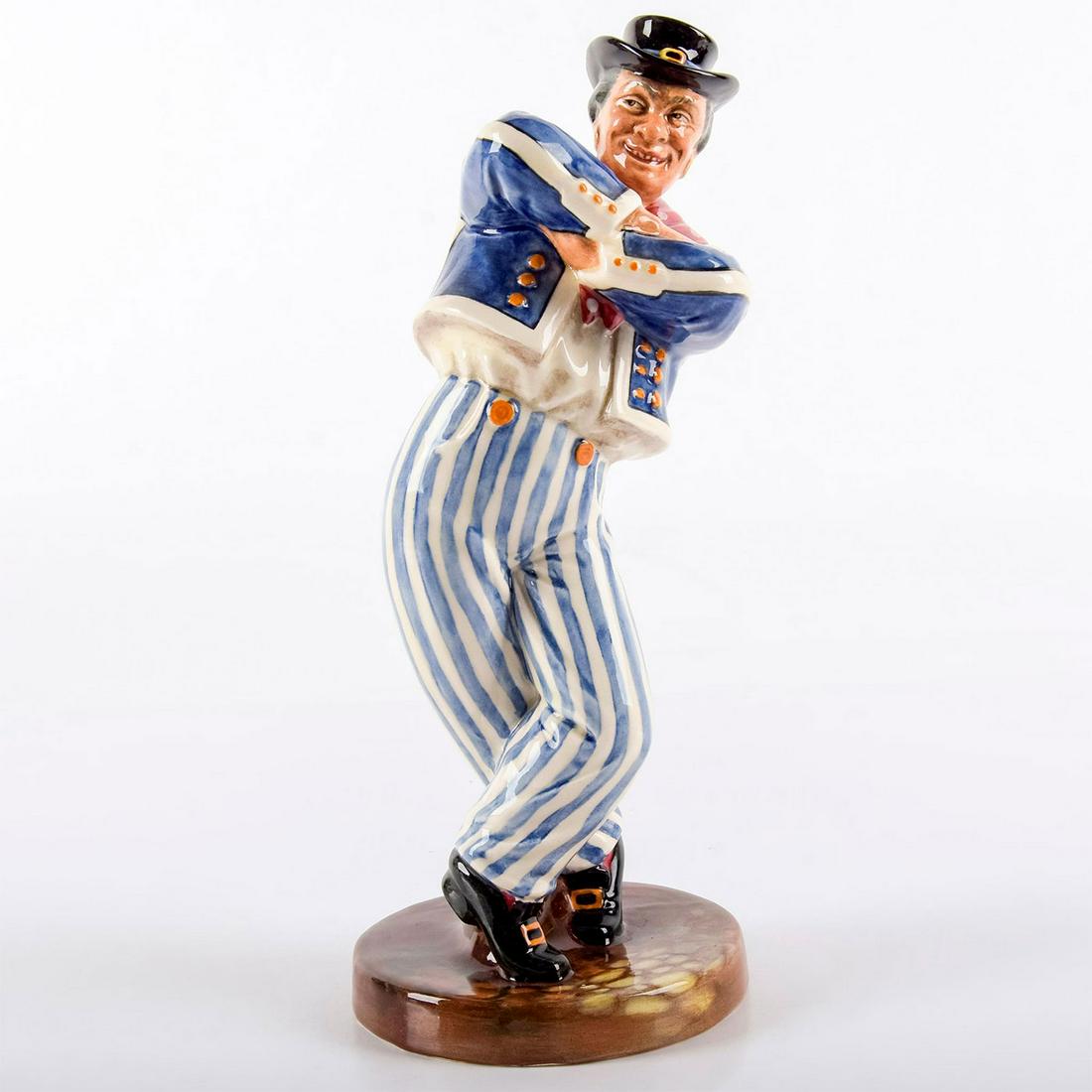 The Hornpipe HN2161 - Royal Doulton Figurine: Man with his arms crossed in a blue and white striped suit and black hat. Glazed finish. Royal Doulton backstamp. Weight: 15oz #hornpipe #stripes #royaldoulton Artist: M. Nicoll Issued: 1955-1962 Dime