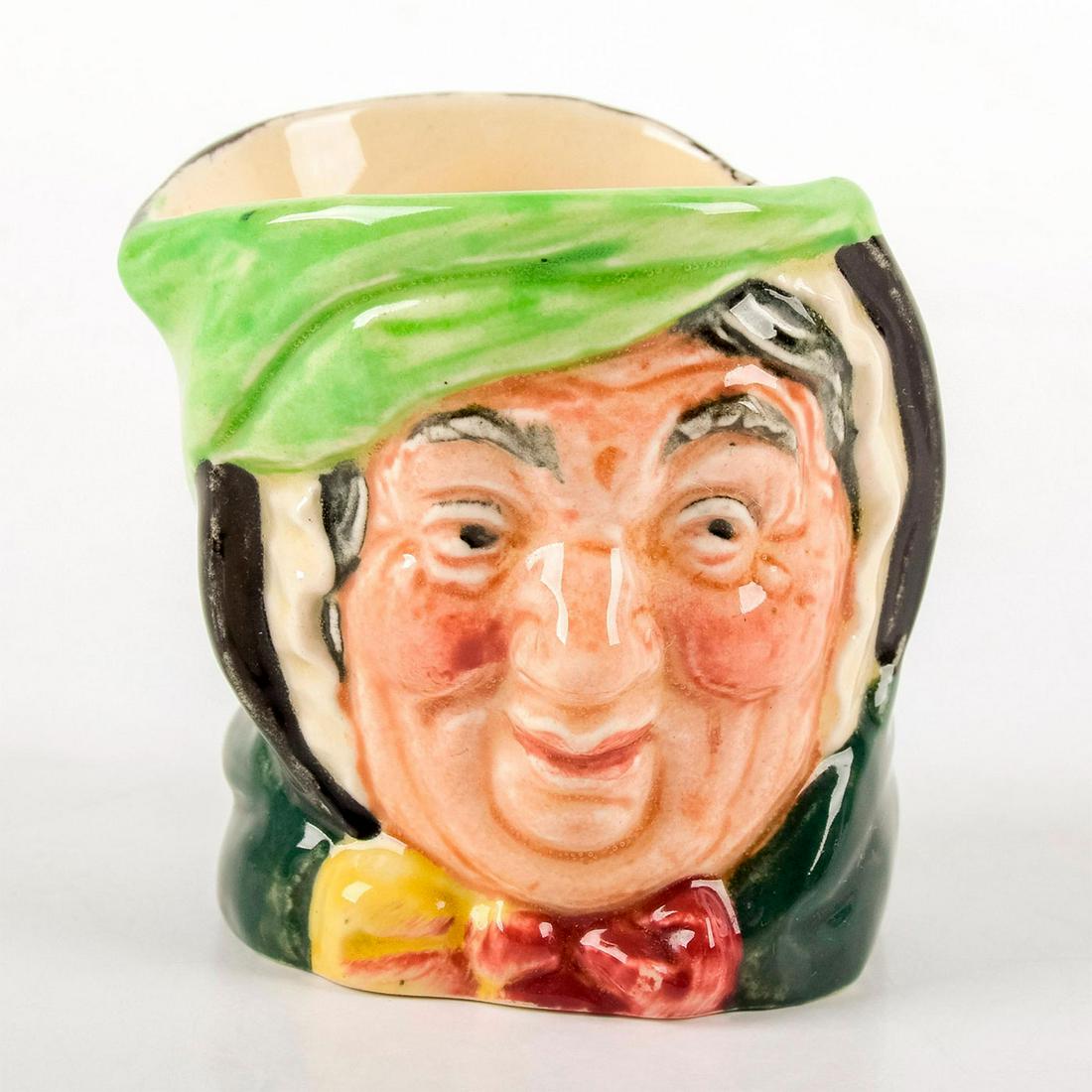 Royal Doulton Sairey Gamp Toothpick Holder D6150: Character from Charles Dickens' 1843 novel Martin Chuzzlewit". Black and green coloration. Doulton backstamp. Good condition. Artist: Leslie Harradine and Harry Fenton Issued: 1940-1942 Dimens