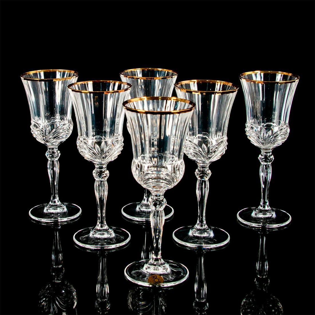 Set of 6 Royal Crystal Rock Aurea Gold Wine Glasses: Elegant blown glass; gold tint rim; circular base. One glass marked with Royal Crystal Rock sticker. Good condition. #crystal #royalcrystalrock #wine #glass Issued: 1989 - 2002 Dimensions: 3"W x 7.5"H