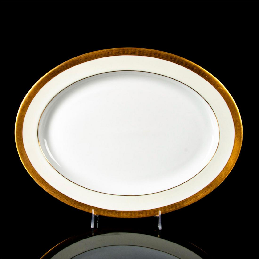 Minton Buckingham K-159, Large Oval Serving Platter: Bone China. Gold encrusted edge, cream rim, and white center. Minton backstamp. #minton #bonechina #platter Issued: 1926 - 2009 Dimensions: 16.25"L x 12.25"W x 1.2"H Manufacturer: Minton Country of Or