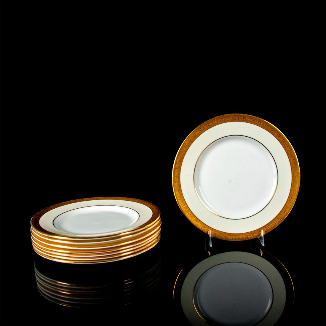 8pc Minton Buckingham K-159, Salad Plate Set: Bone China. Gold encrusted edge, cream rim, and white center. Minton backstamp. Small mark on one plate. #minton #bonechina #saladplate Issued: 1926 - 2009 Dimensions: .75"H x 8" dia. Manufacturer: Mi