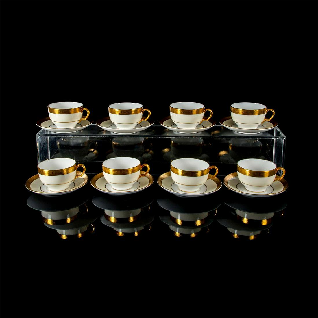 16pc Minton Buckingham K-159, Footed Cup and Saucer Set: 8 cups and 8 saucers. Bone China. Gold encrusted edge, cream rim, and white center. Minton backstamp. Footed Cup: 2.3"H x 3.5"Diameter. Saucer: 1"H x 5.75"Diameter. #minton #bonechina #cupandsaucer Is