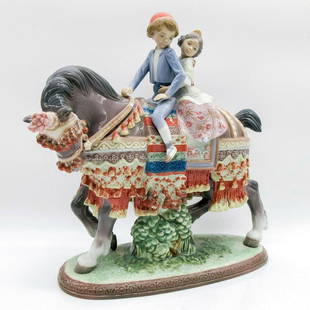 Valencian Children 1001489 - Lladro Porcelain Figurine: Glossy finish; Two children ride beautifully decorated horse. Lladro backstamp. Artist: Francisco Catala Issued: 1986-2008 Dimensions: 10.25"H x 11"W Manufacturer: Lladro Country of Origin: Spain