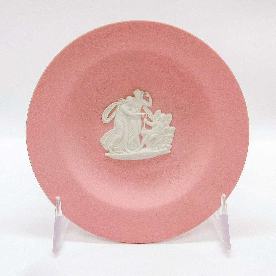 Wedgwood Pink Jasperware Plate: Pink stoneware plate with cream neoclassical sprig in relief. Impressed Wedgwood backstamp. #wedgwood #jasperware #neoclassical Issued: 20th c. Dimensions: 4.5" dia. Manufacturer: Wedgwood Country of 