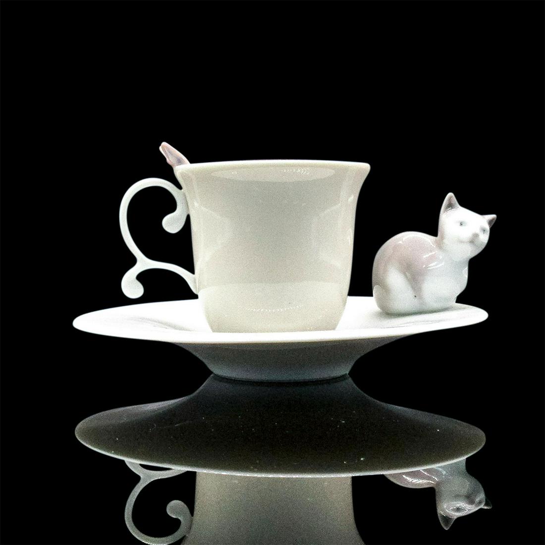 Springtime Pals Cup and Saucer 1006047 - Lladro Porcelain Decor: Glossy finish, Lladro backstamp on both pieces. Artist: Design & Decoration Dept. Issued: 1994-2000 Dimensions: 2.25"H Manufacturer: Lladro Country of Origin: Spain