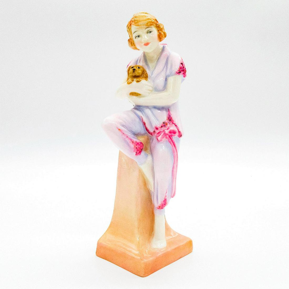 Lido Lady HN4247 - Royal Doulton Figurine: Second version. Young lady in a pink outfit, sitting on a pedestal holding a puppy. Inspired by the original model by Leslie Harradine exclusively for the Royal Doulton International Collectors Club. 