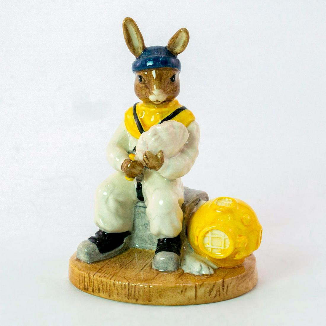 Deep Sea Diver DB273 - Royal Doulton Bunnykins: White, yellow, black, grey, and blue coloration. Royal Doulton backstamp. Certificate included. Limited edition number 2657 of 3000 pieces. Weight: 6.6 oz Artist: S. Ridge Issued: 2003 Dimensions: 4.7