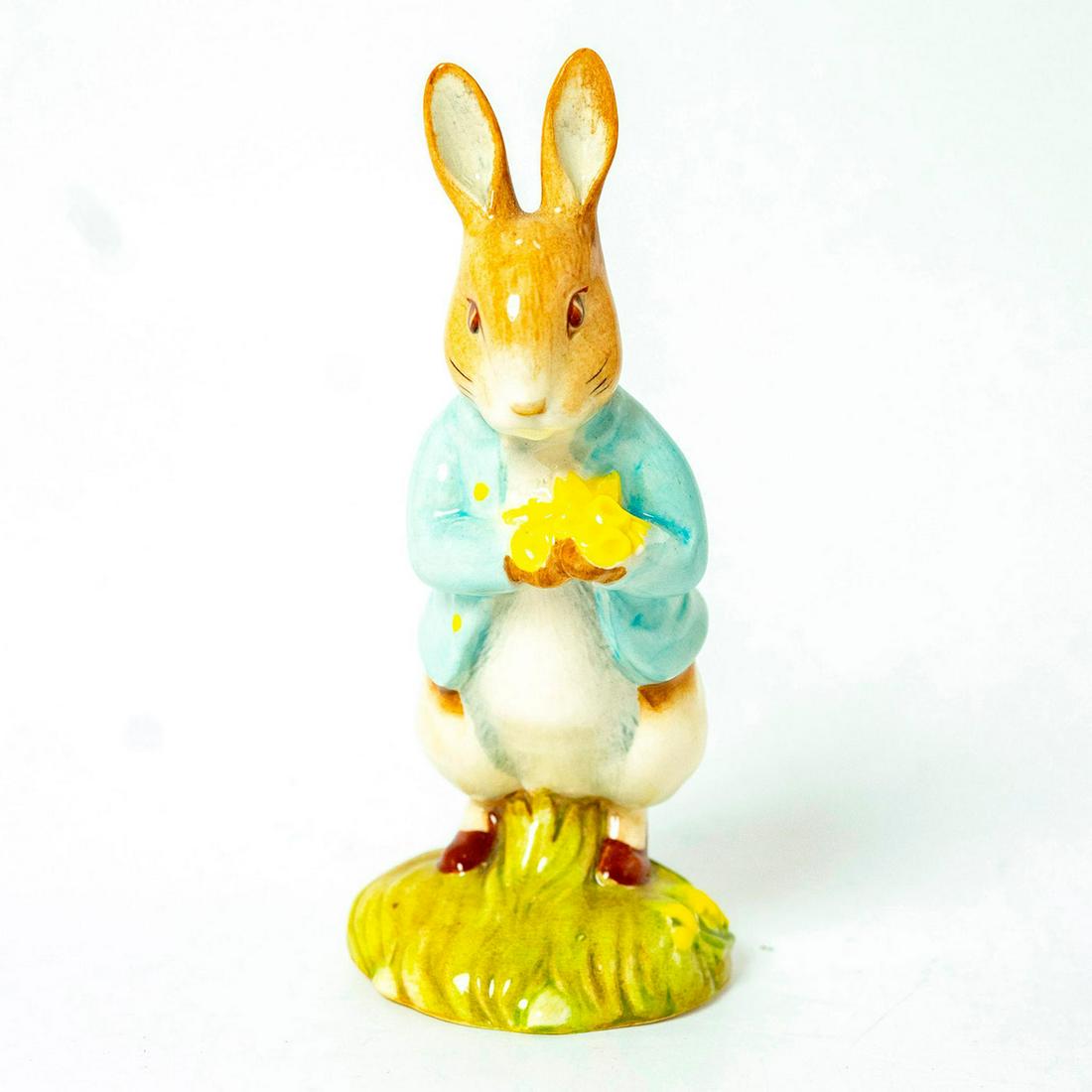 Peter with Daffodils - Beatrix Potter Figurine: Beswick Backstamp. Artist: Warren Platt Issued: 1996 - 1999 Dimensions: 4.75"H Manufacturer: Beswick Country of Origin: England