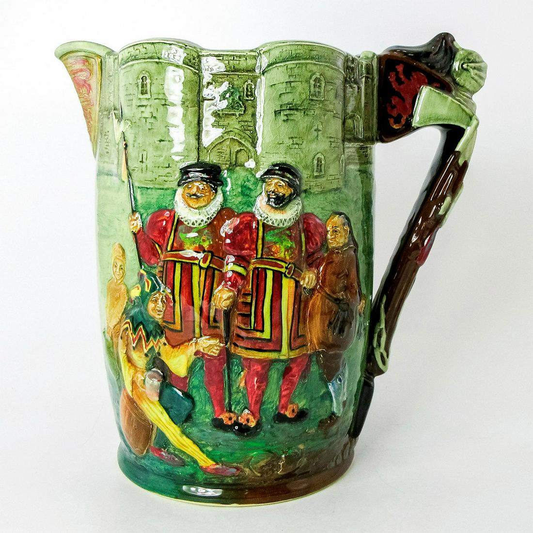 Royal Doulton Jug, The Tower of London: Portrays a lord and lady, with Yeoman, turnkey, and more guards in relief. The spout is modeled as a shield with the lions of England; the handle is decorated with axes, pikes, chains, and a suit of a