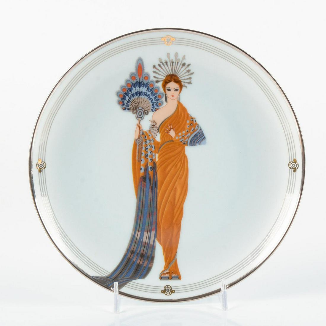 Franklin Mint House of Erte Collector Plate, Athena: Fine porcelain; bordered and individually hand-numbered in platinum. Includes certificate of authenticity. Limited edition of 45 firing days; edition number HD6896. Franklin Mint backstamp. Good condi