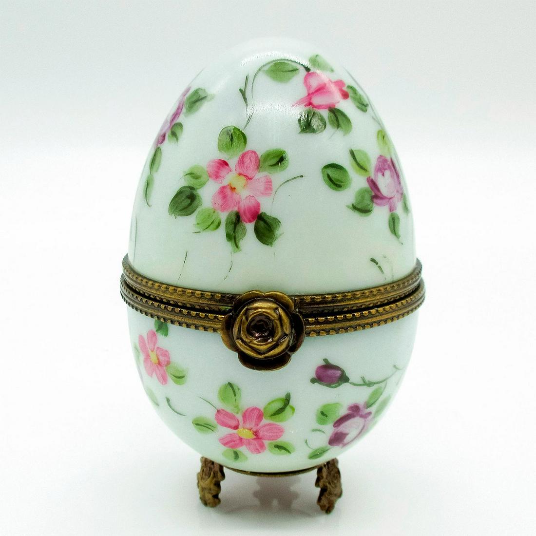 Floral Egg - Limoges Trinket Box: Rare hand painted porcelain hinged box in the form of an egg. White egg with pink and white flowers. Hinged lid. Box opens perfectly and reveals a figure of a pink rose inside. Peint Main, Limoges Fra