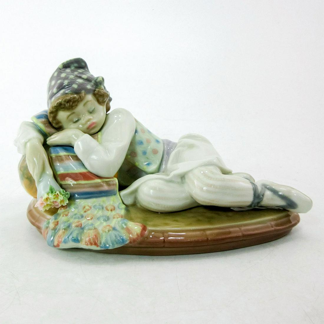 Valencian Dreams 01001525 - Lladro Porcelain Figurine: Glossy porcelain. Lladro backstamp. Artist: Antonio Ramos Issued: 1987 - 1991 Dimensions: 3.5"H Manufacturer: Lladro Country of Origin: Spain