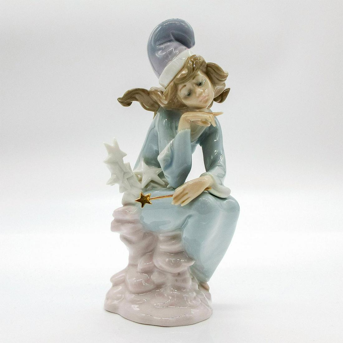 Wishing on a Star 1001475 - Lladro Porcelain Figurine: Glossy finish, Lladro backstamp. Artist: Antonio Ramos Issued: 1985-1987 Dimensions: 6.75"H Manufacturer: Lladro Country of Origin: Spain