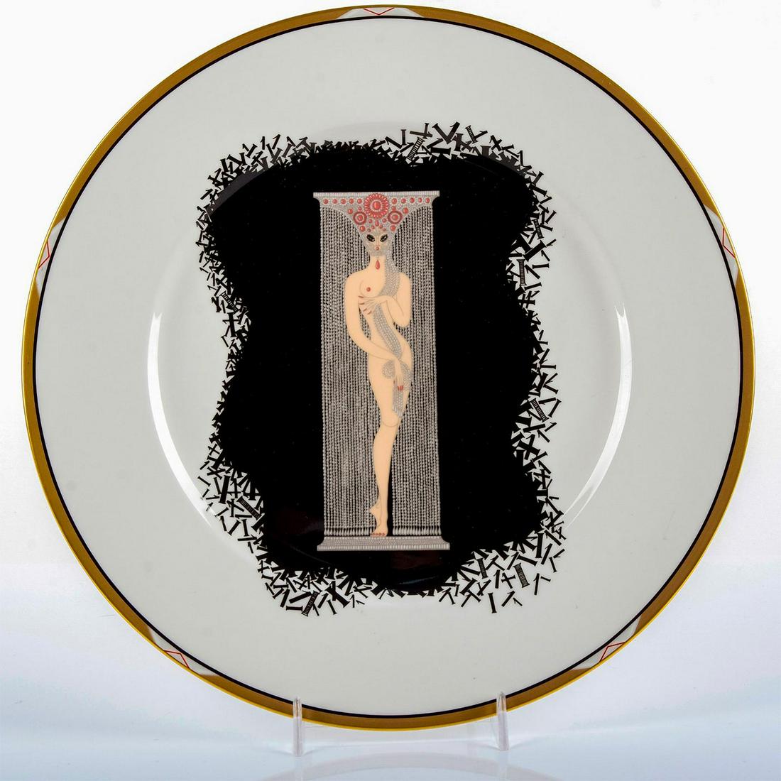 Mikasa Erte Bone China Charger, The Numerals 1, A3201: Gold tone rim; nude woman in ornate headdress forming the numeral 1. Erte backstamp. Title and item number on back. Good condition. #mikasa #erte #plate #numerals Issued: 1987 Dimensions: 12" dia. Man