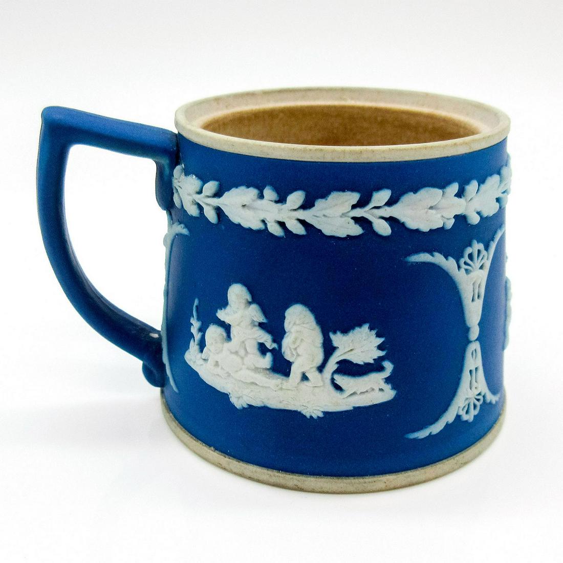Wedgwood Miniature Jasperware Dip Tankard: Cobalt blue Jasper dip with cream color reliefs of 'Boys at Play'. Miss lid. Wedgwood backstamp. #Wedgwood #JasperDip Issued: 1891 Dimensions: 3"L x 2"H x 2.5" dia. Manufacturer: Wedgwood Coun
